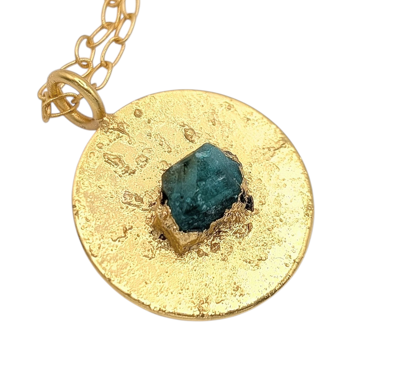 Gold pendant with a emerald
