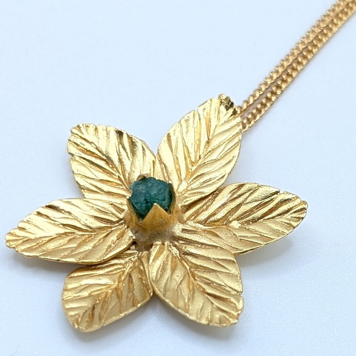 Muze Emerald Flower Pendant Necklace