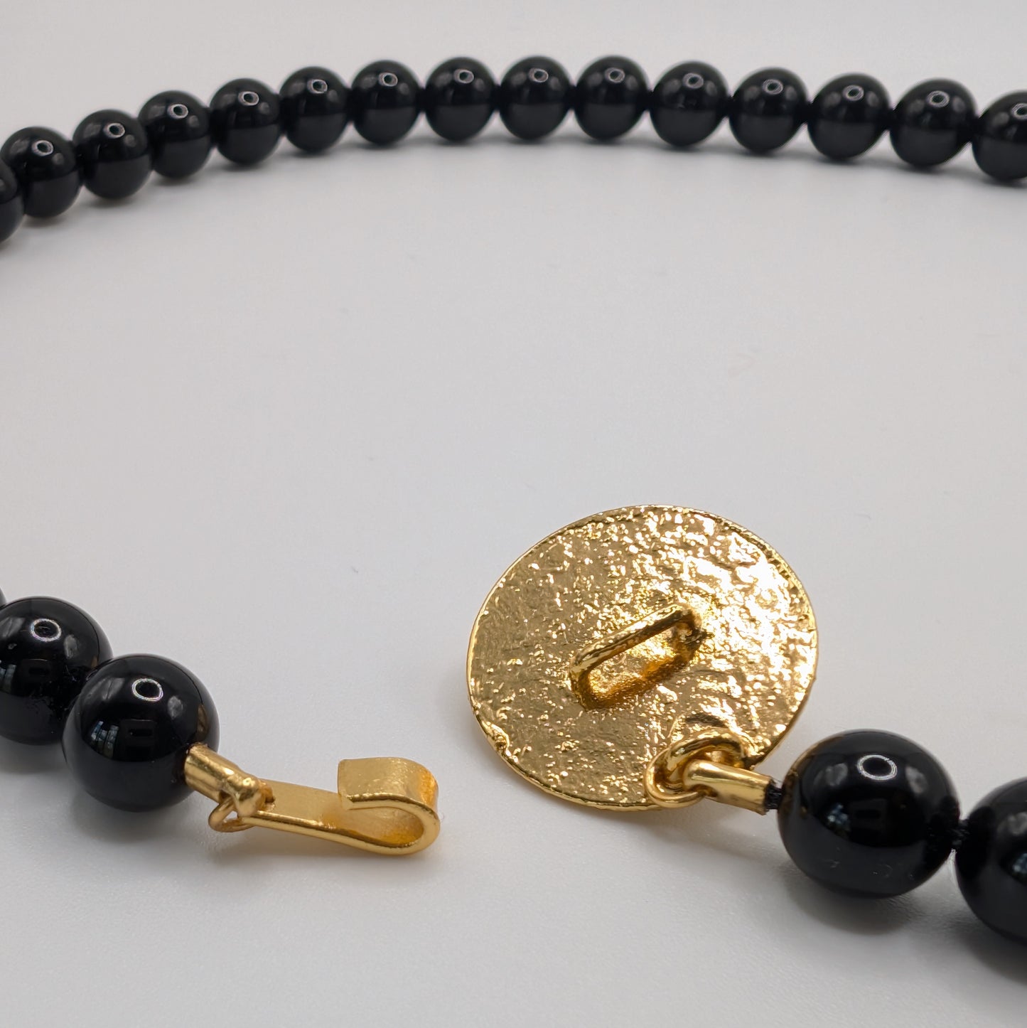 Alma Emerald and Onix Necklace
