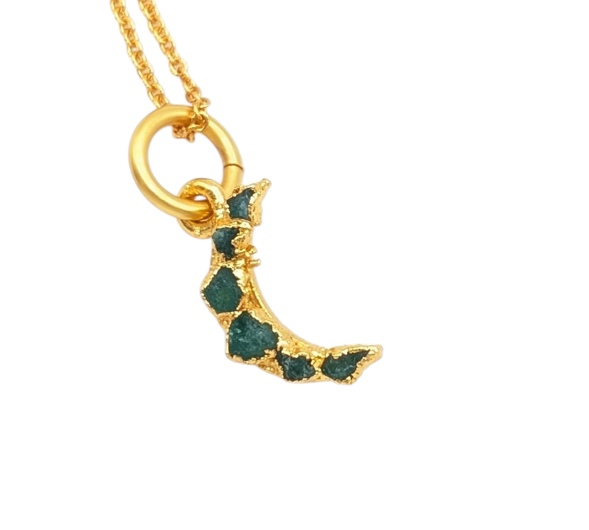 Gold necklace with a crescent moon pendant featuring Colombian emeralds